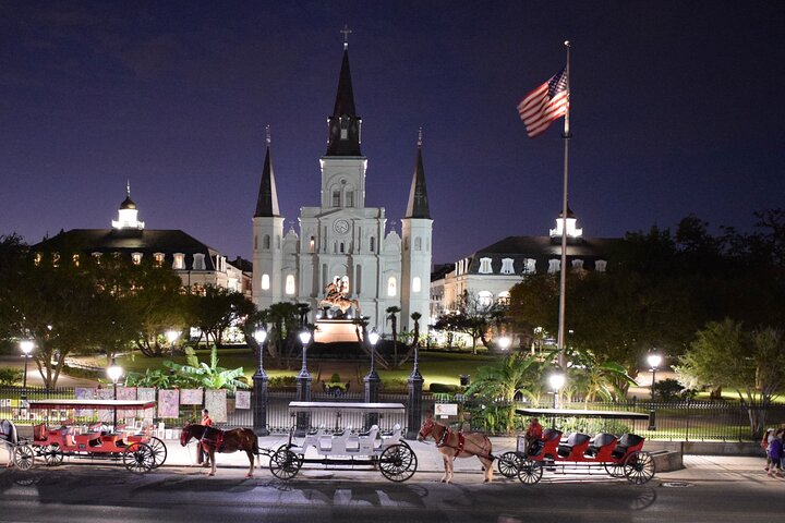 a group of people performing on stage in front of Jackson Square