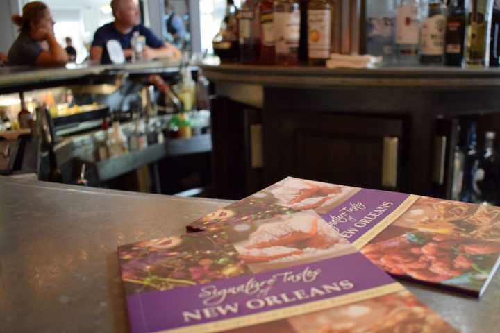 a person sitting at a table in a restaurant