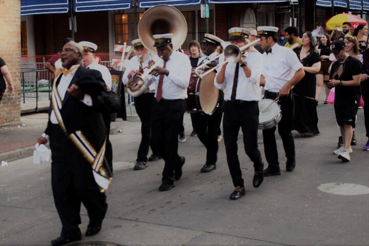 a group of people standing in front of a crowd