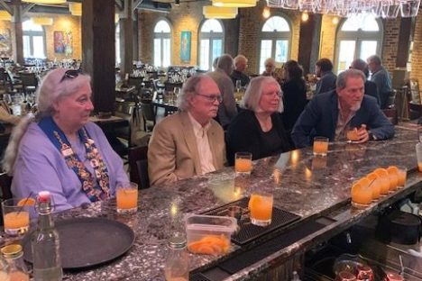 a group of people performing on a counter