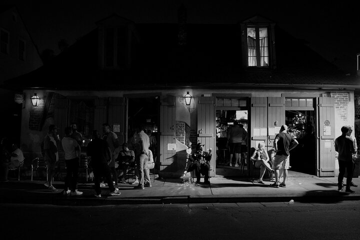 a group of people standing in front of a building