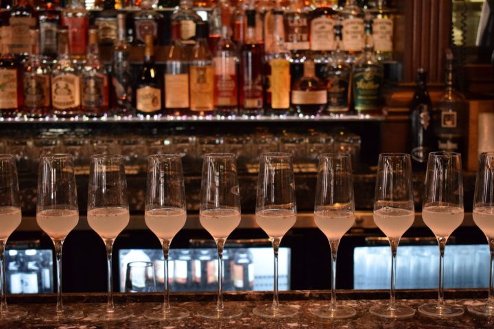 a bottle and a glass of wine