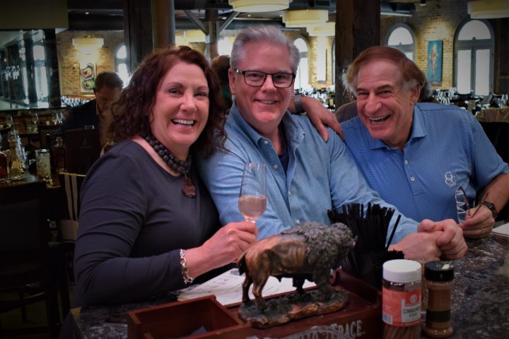 Christine Hollinden et al. sitting at a table