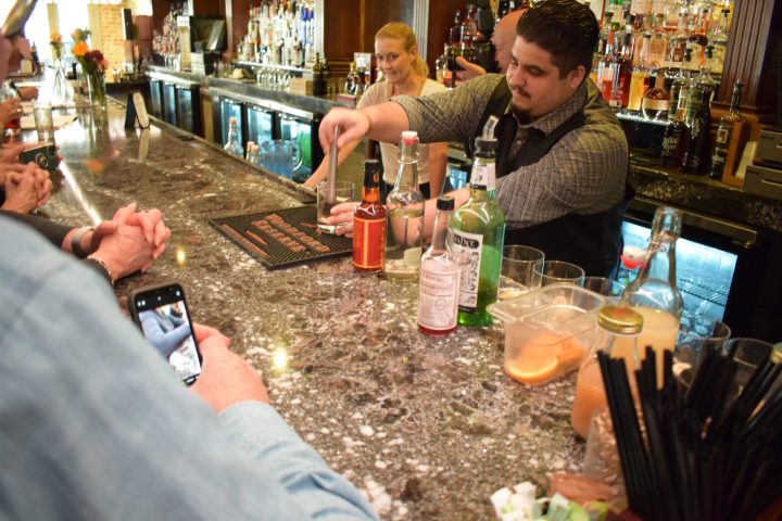 a group of people sitting at a table