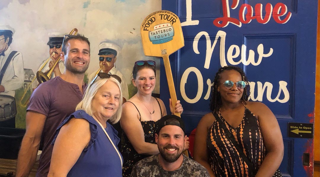 Tourists Enjoying Best Food And Cocktails In New Orleans