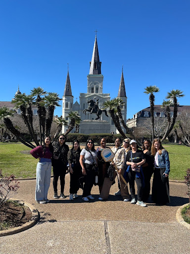 Girls enjoying a food tour in New Orleans with Tastebud Tours.