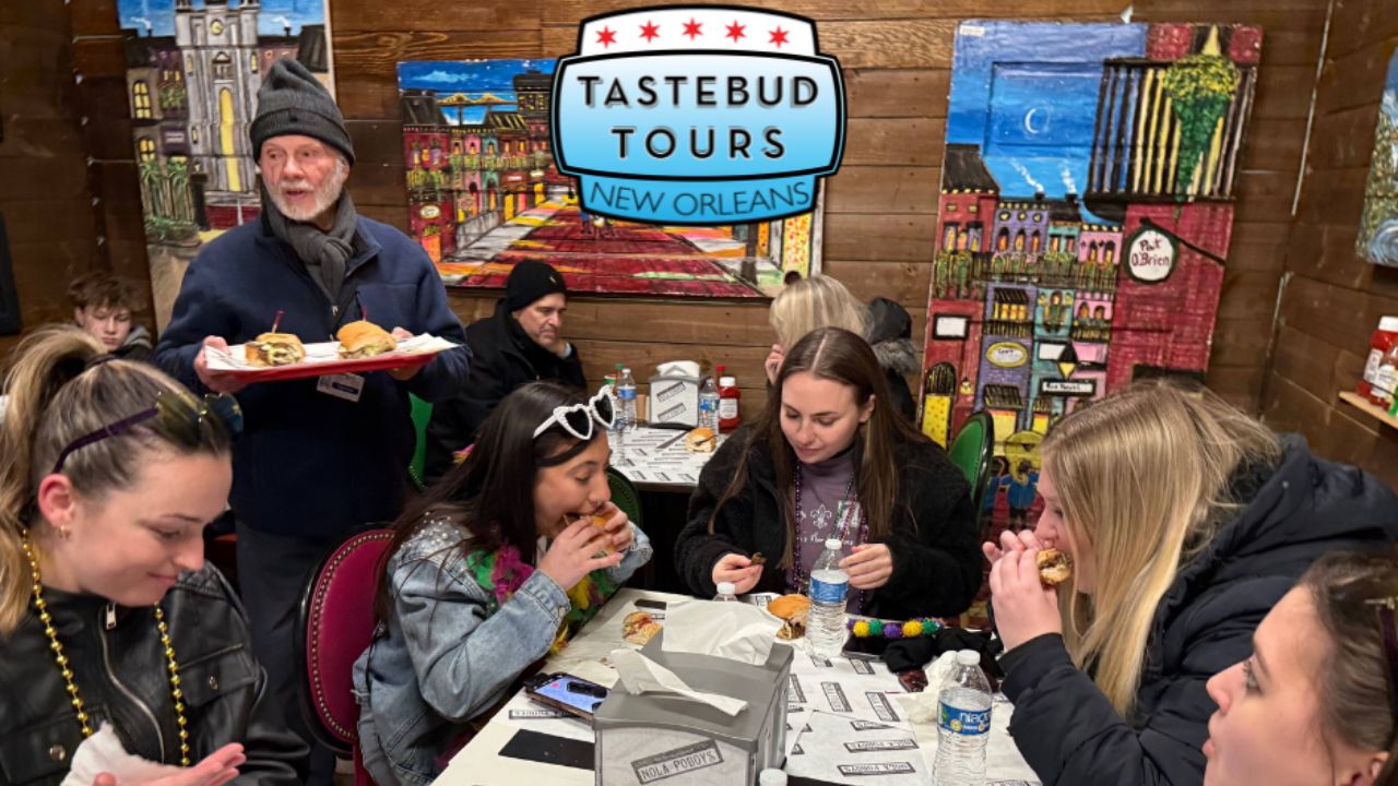 Tastebud Tours team brunch, enjoying sandwiches during a New Orleans food tour.