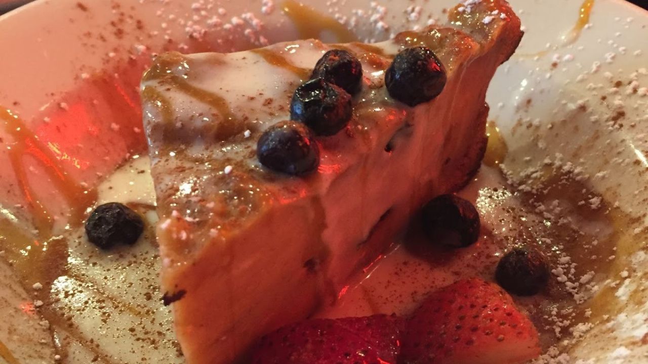 Slice of creamy cheese cake photographed in New Orleans.