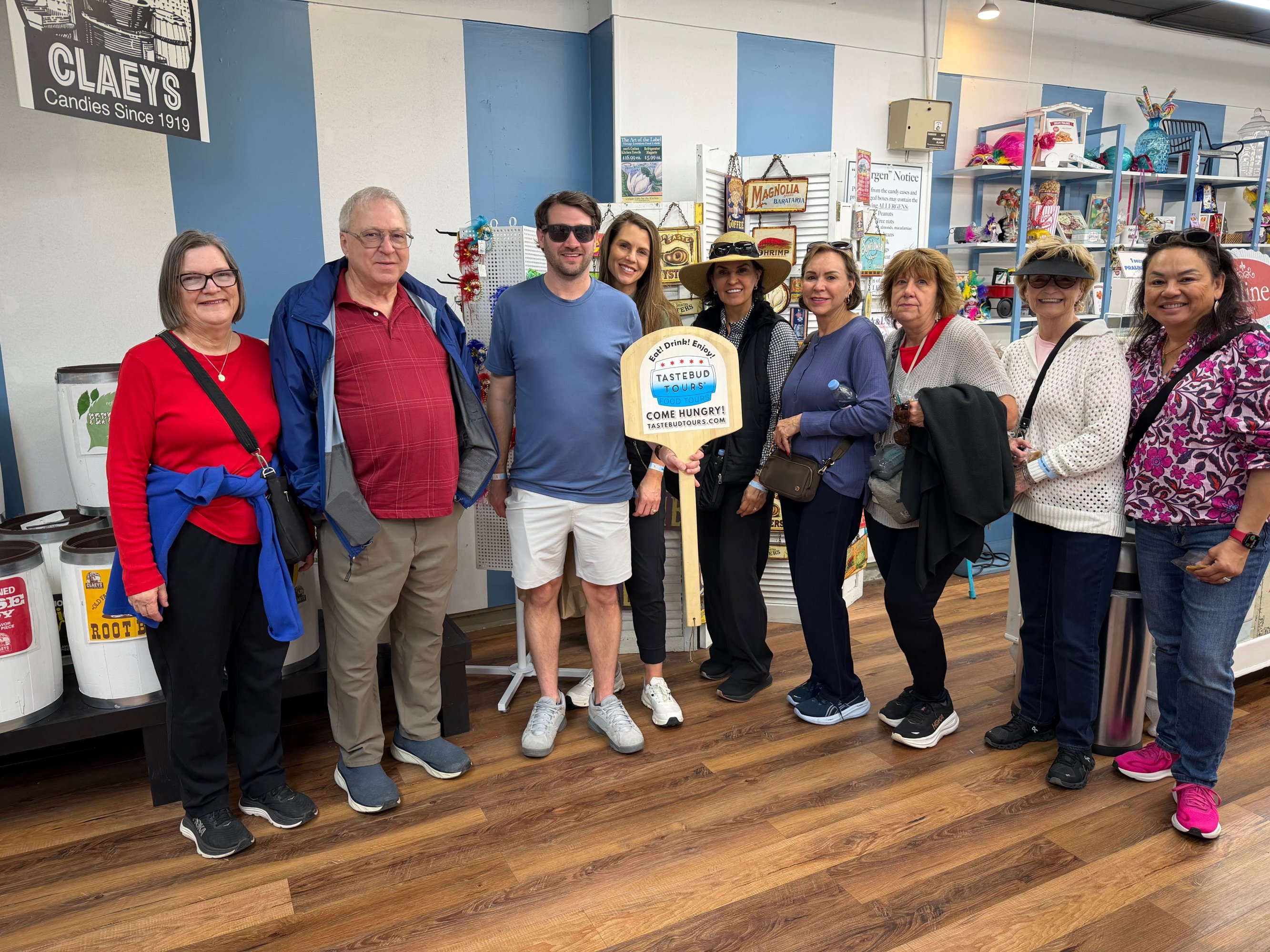 Group of tourists on a guided food tour with Tastebud Tours.