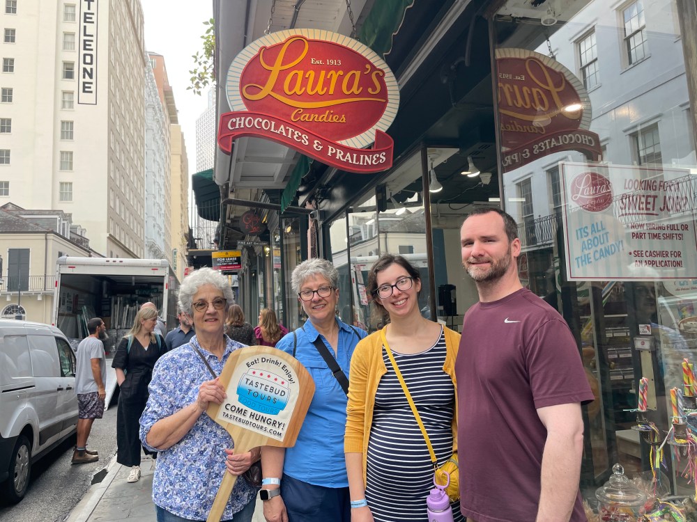 Quiet street in the French Quarter with small local food places.