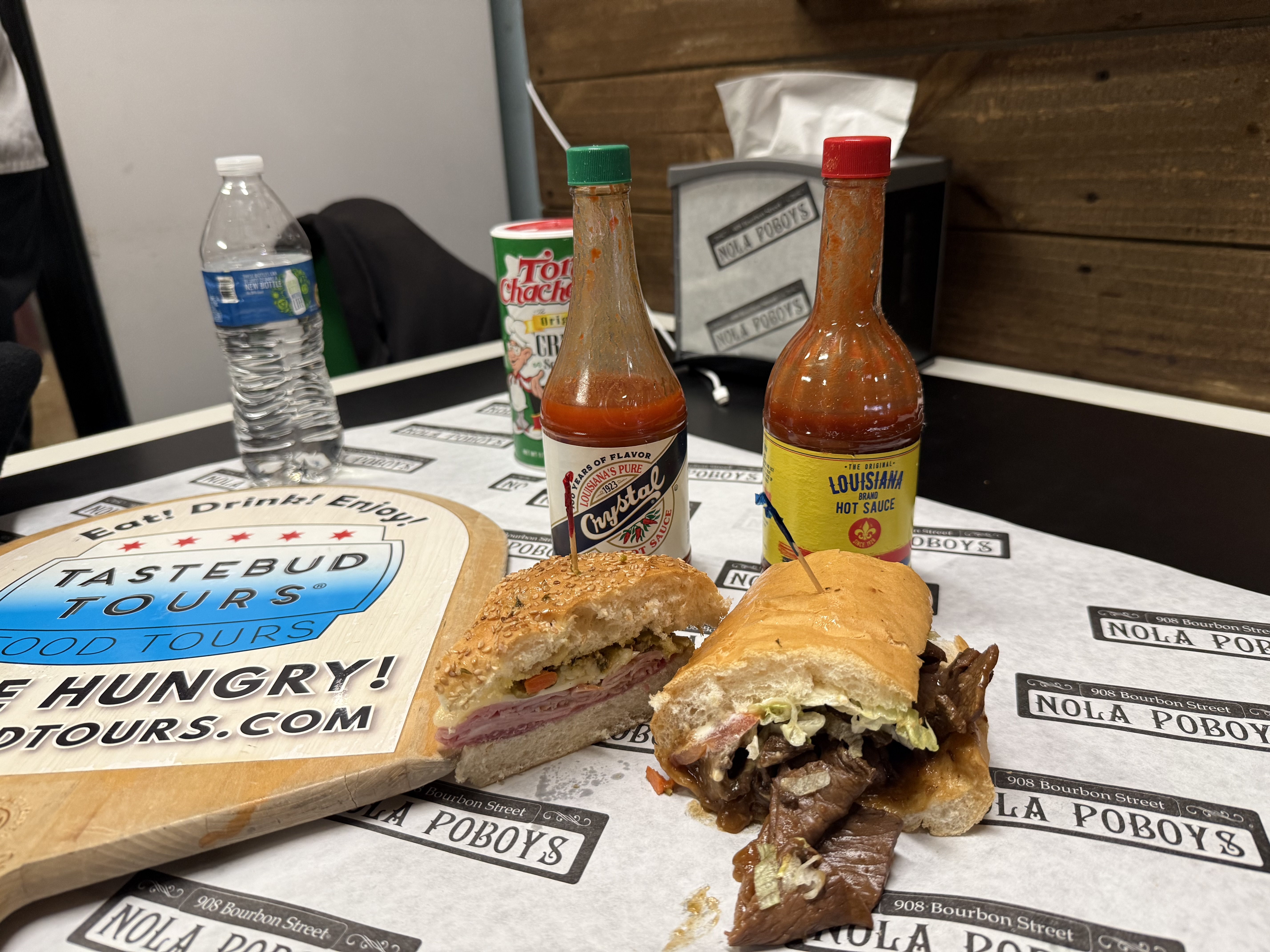 Close-up of po’boys showcasing New Orleans culinary traditions.
