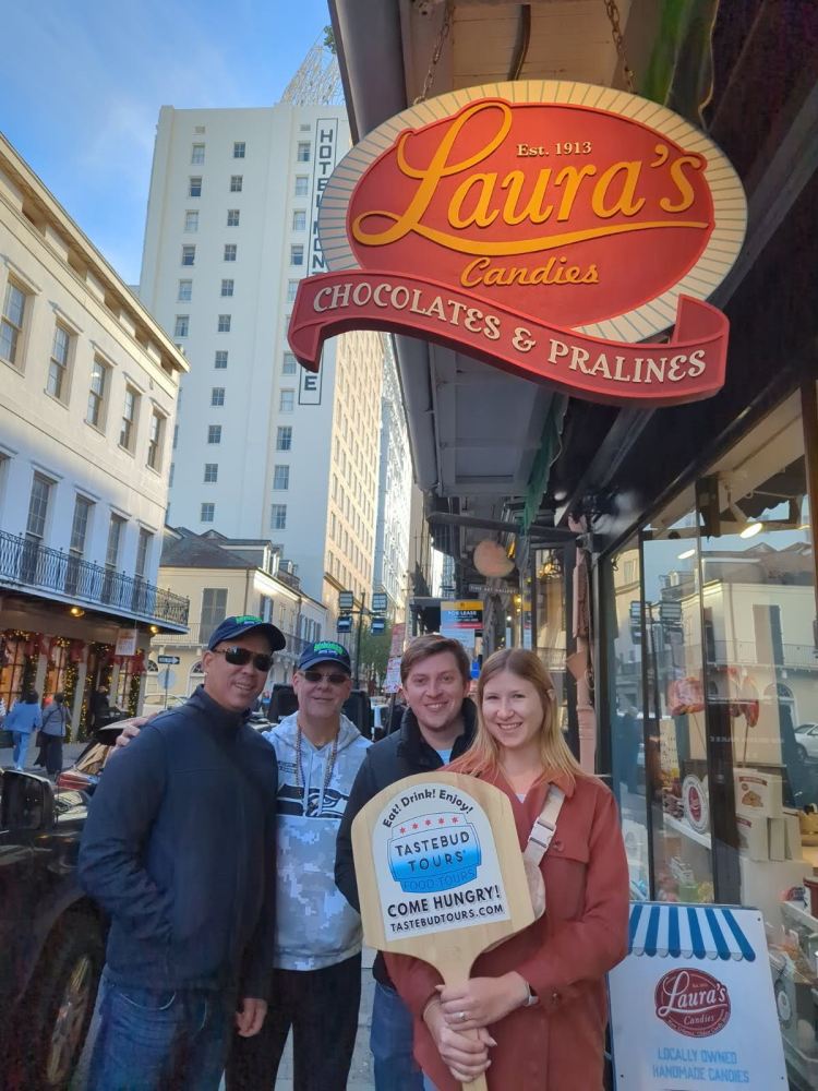 Guests standing outside Laura bakery in New Orleans.