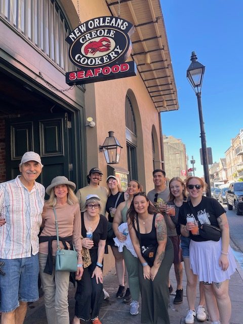 Food tour group outside New Orleans Creole Cookery.
