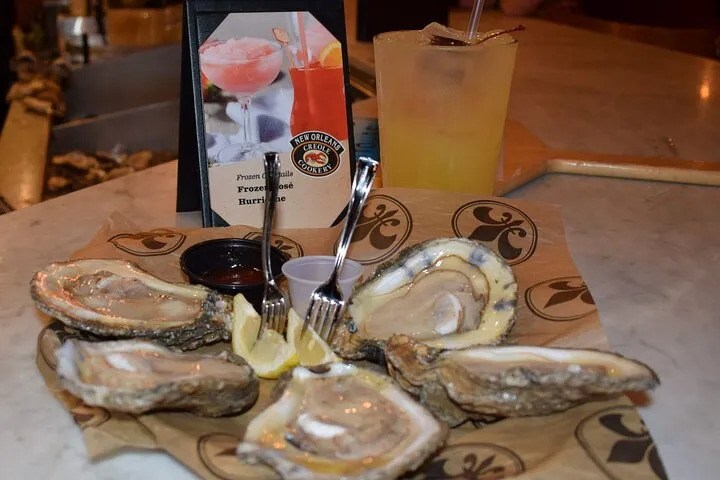 Fresh chargrilled oysters served with lemon and dipping sauces at the restaurant.