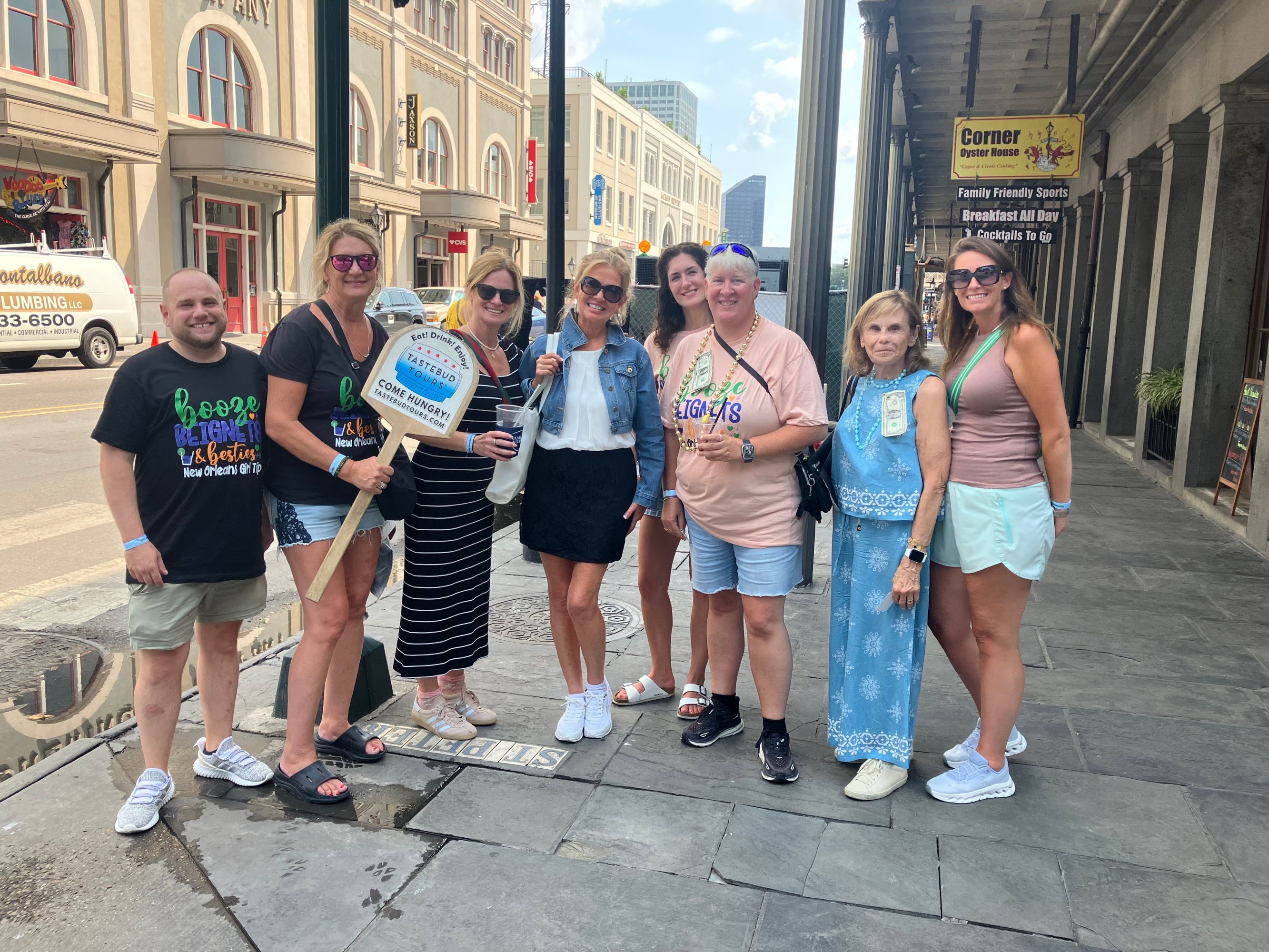 Guests enjoying a New Orleans food tour experience with Tastebud Tours.