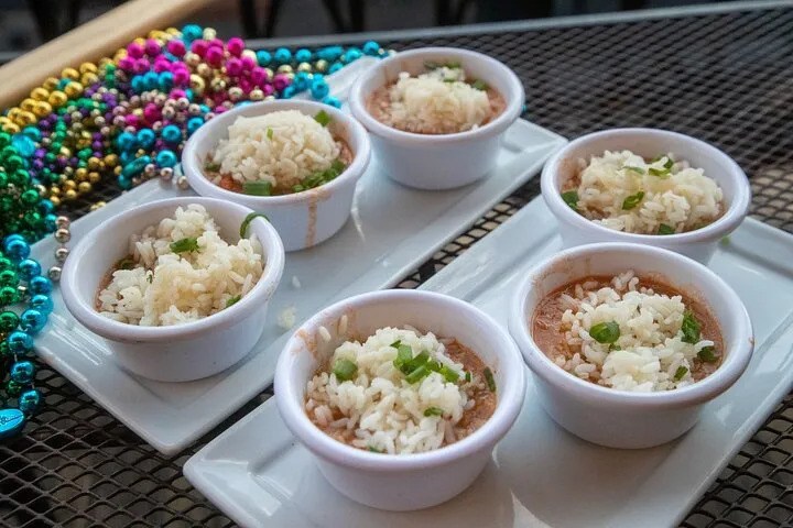 New Orleans soul food tasting featuring jambalaya rice cups and local flavors on a food tour.